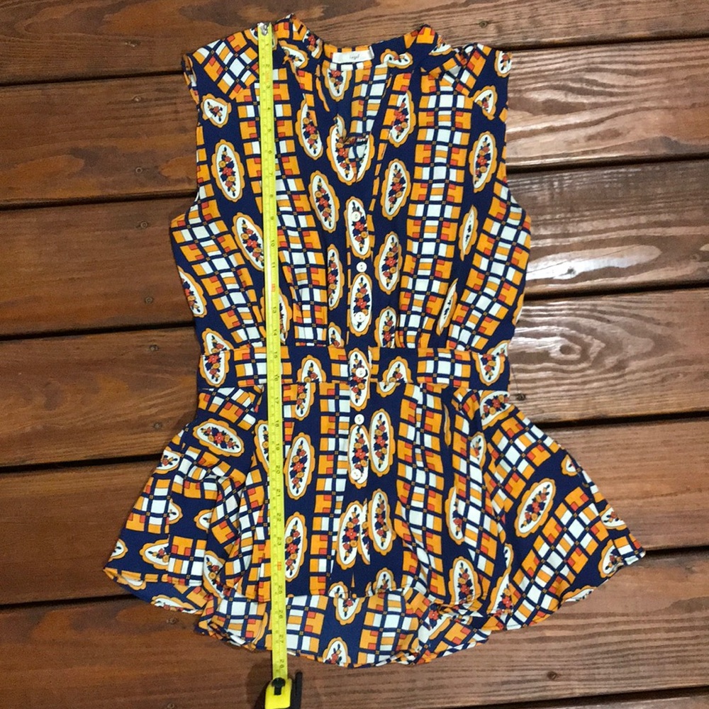 Bold pattern sleeveless shirt with loose peplum - Picture 5 of 6